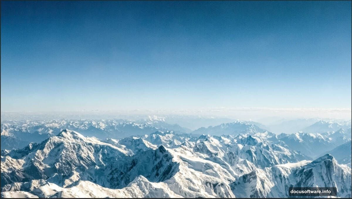 Layer mask with soft brush blending clouds seamlessly into mountains