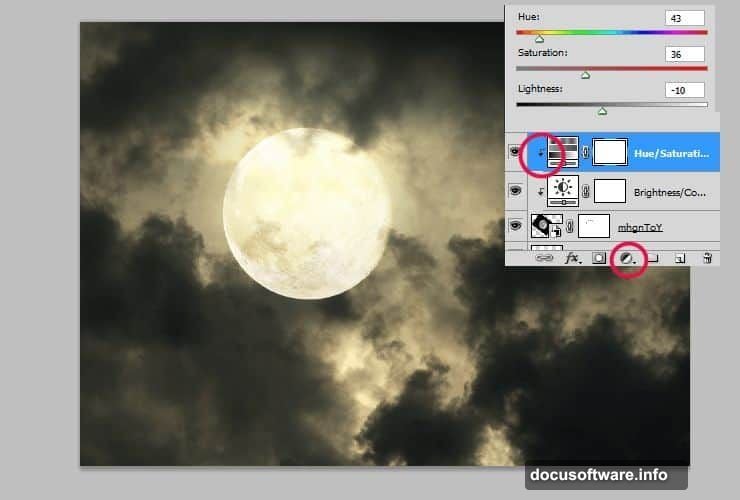 Layer mask with soft brush erasing moon behind clouds for depth