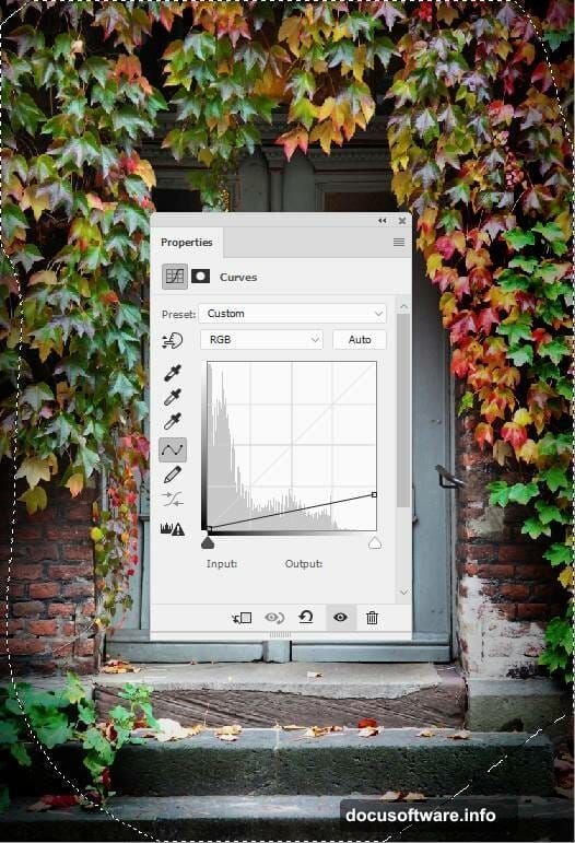 Glowing lamp and magical butterflies added to fantasy door scene