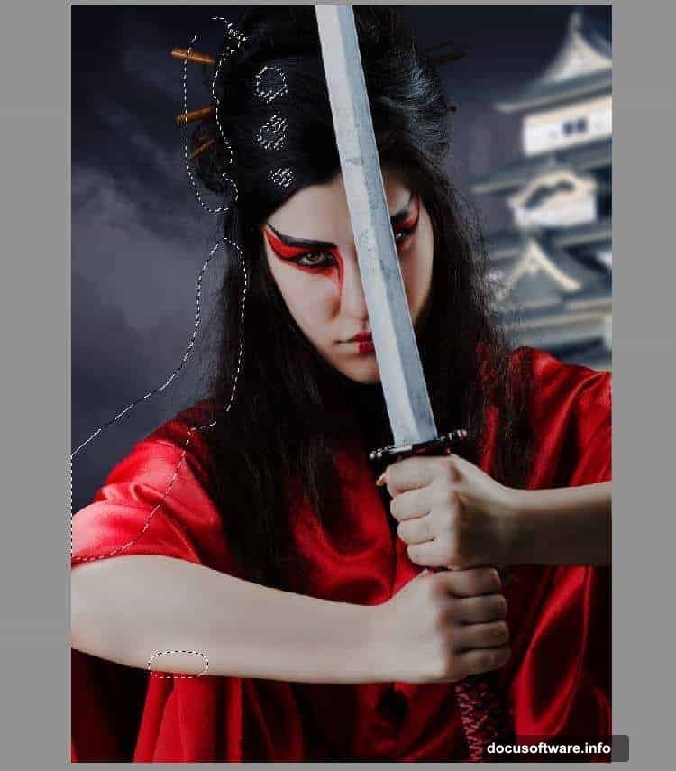 Two fire stock photos and sparks texture combined around samurai figure