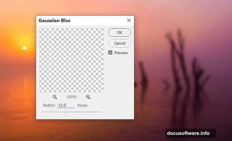 Gaussian Blur radius 12 px softens background trees into hazy depth