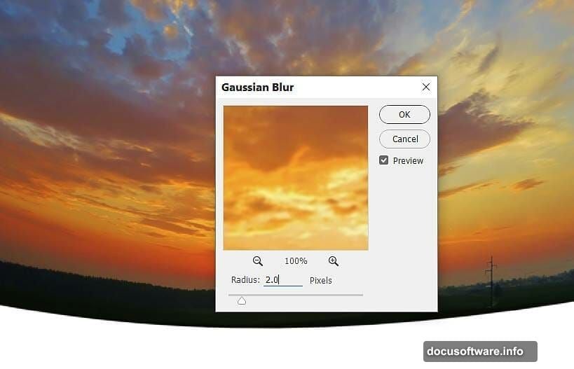 Layer mask painted with black brush removes field sky and bushes