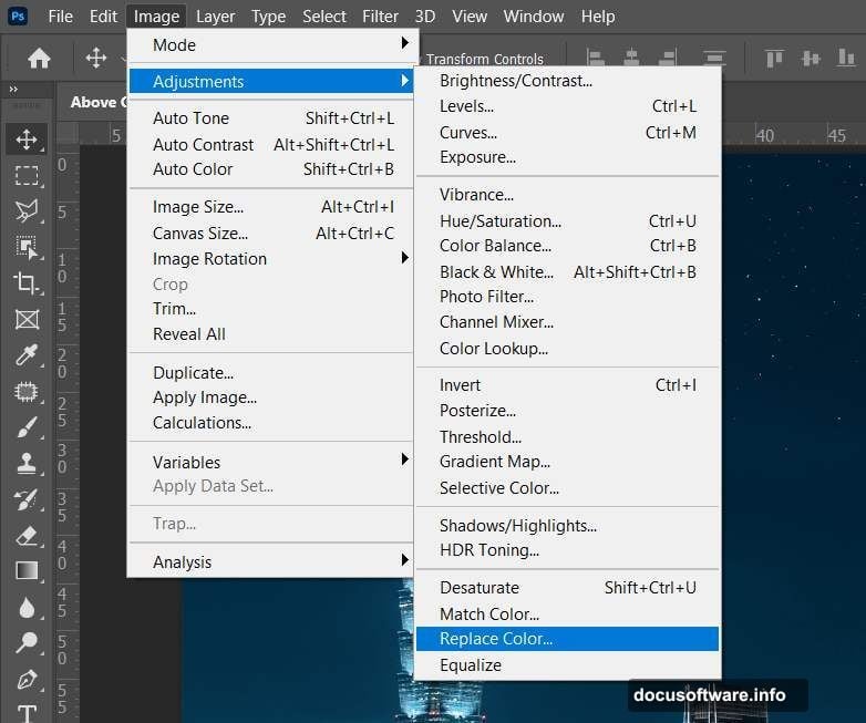 Compositing silhouetted man moon and birds onto urban rooftop night scene