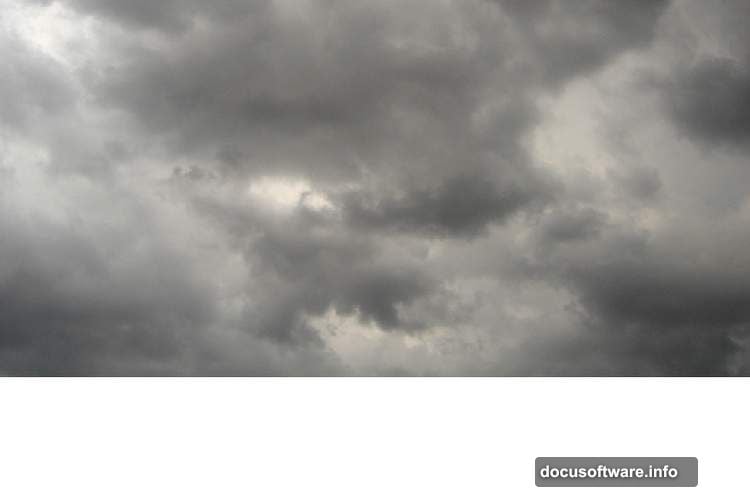 Layer mask with soft black brush blending desert horizon edges