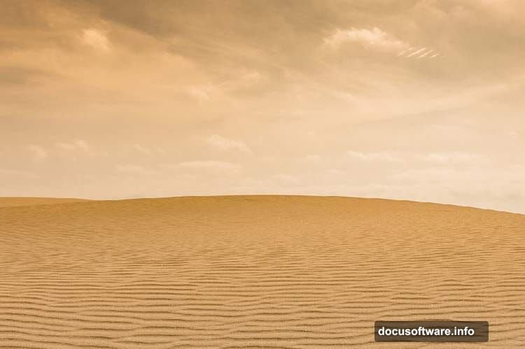 Color Balance adjustment layer adds cool teal tones to desert midtones