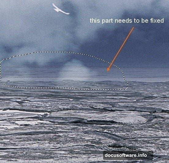 Layer mask with soft black brush blends man figure into portal scene